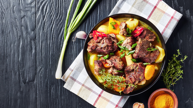 Jamaican curried goat in bowl