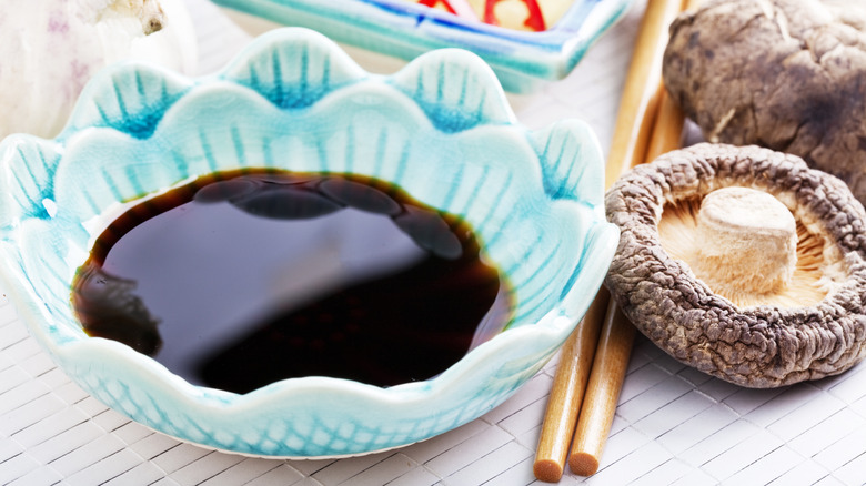 soy sauce in blue dish