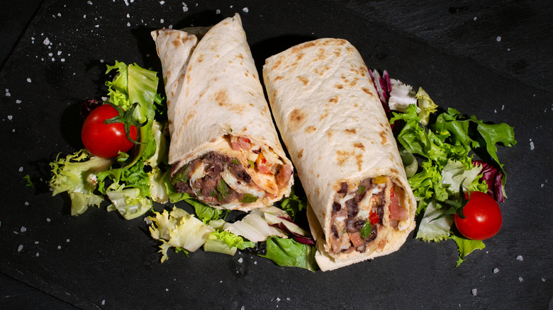 Burritos on a black background