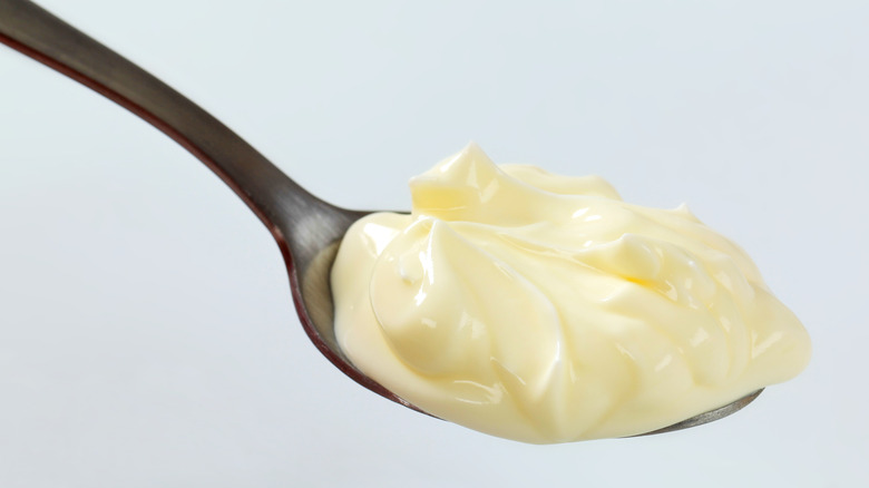 Dollop of mayonnaise on spoon