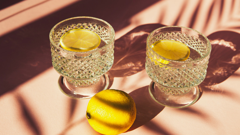 Glasses of water with lemon slices