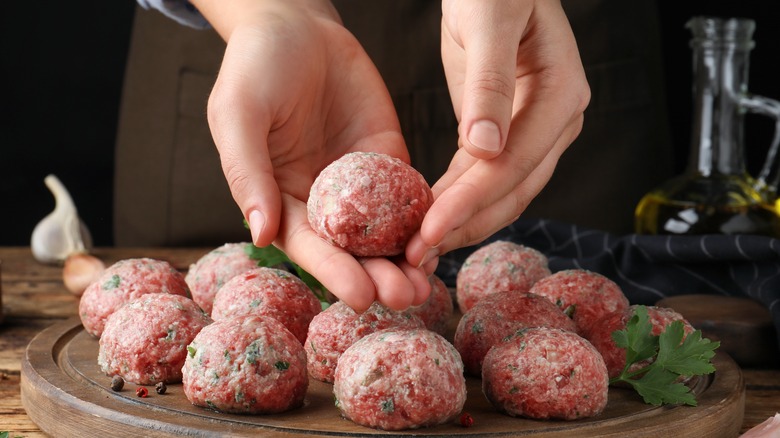 Hand-rolling meatballs