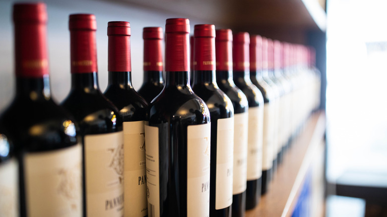 A shelf of wines