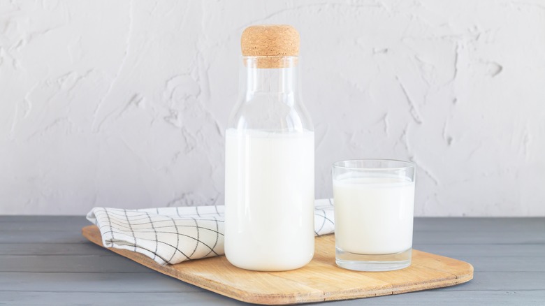 glass bottle and glass of buttermilk