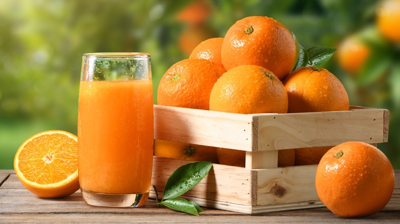 fresh oranges and orange juice