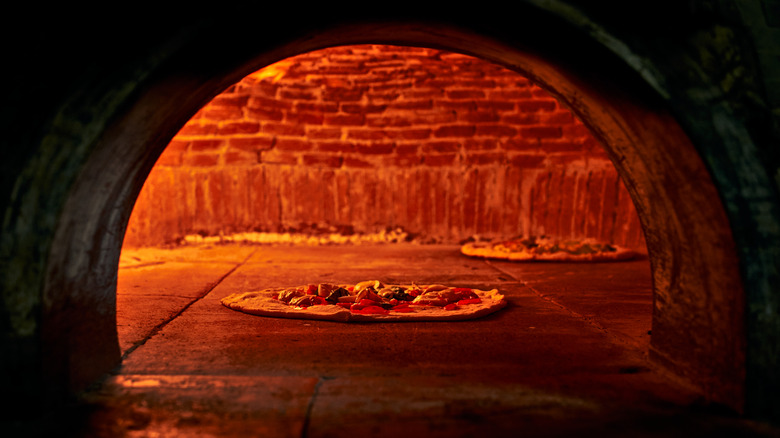 pizza in pizza oven