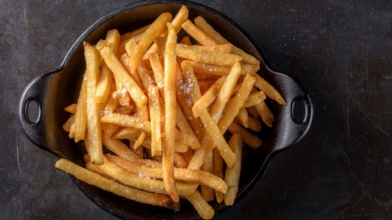 french fries in iron bowl