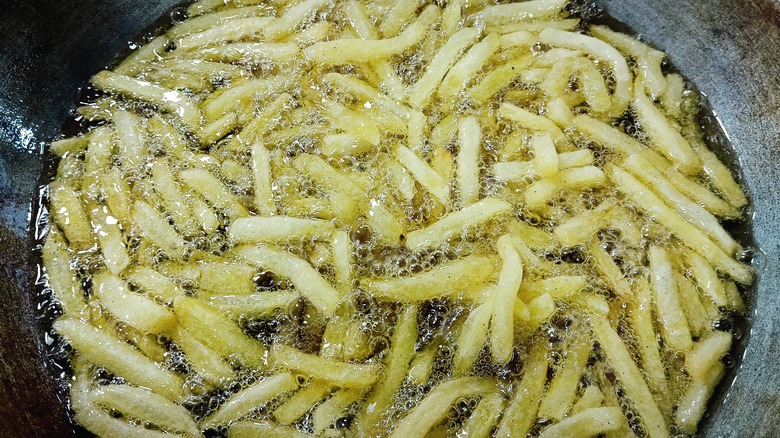 french fries being blanched