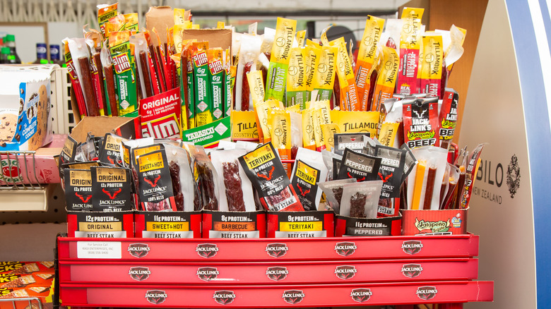 Slim Jims and other jerky on store shelf