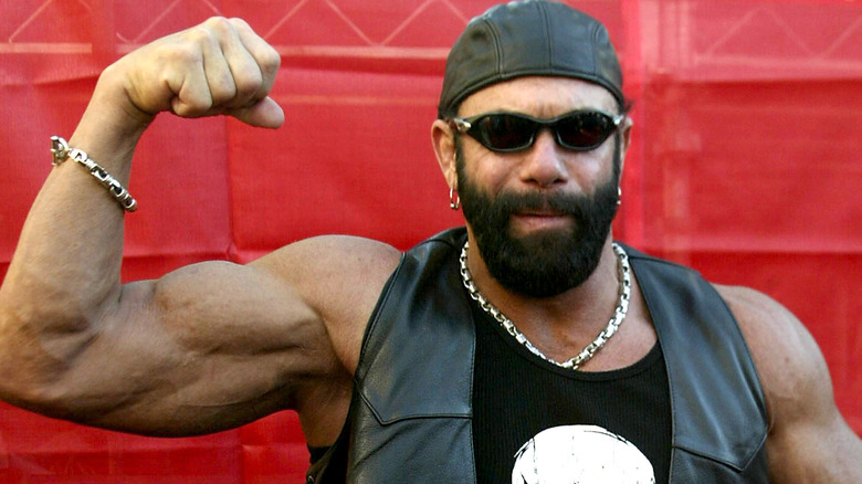 Macho Man Randy Savage flexing