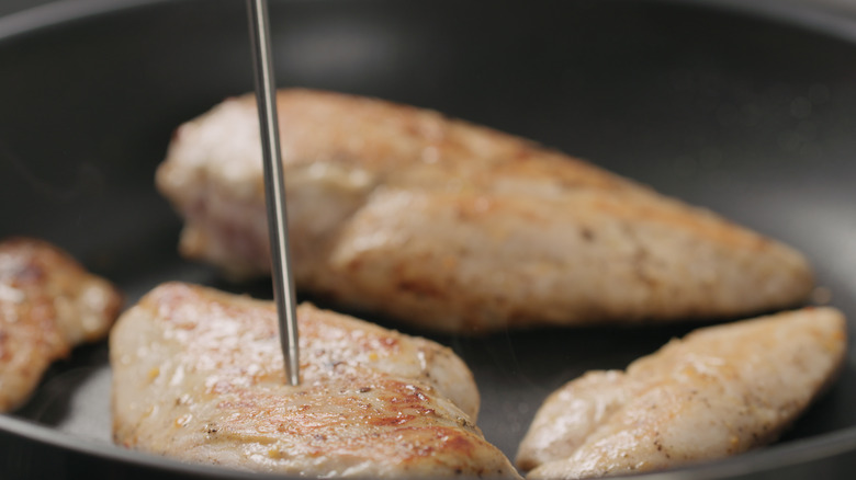 Thermometer in cooking chicken