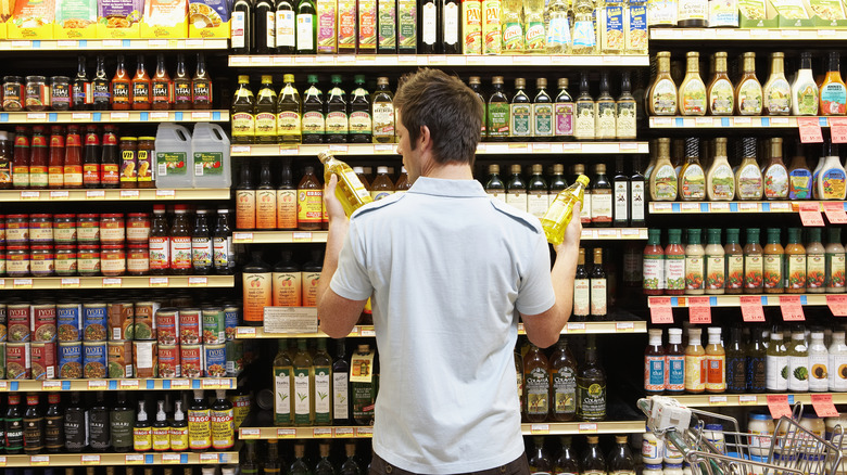 grocery shopper comparing food products