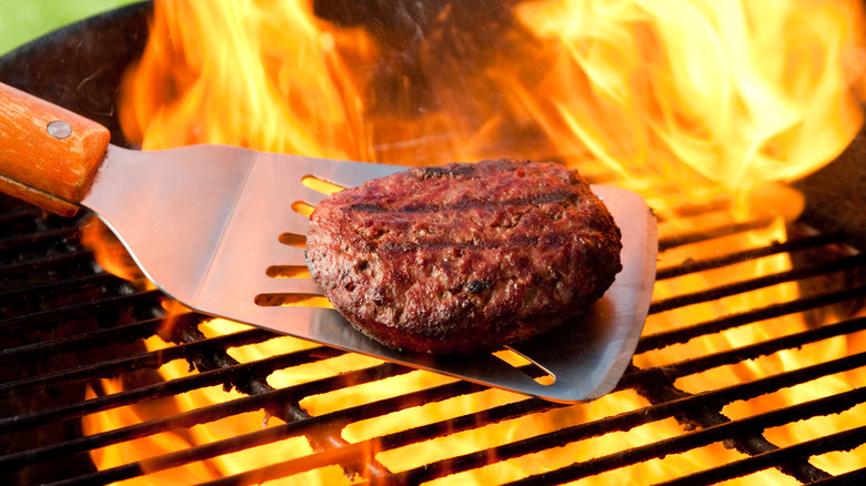 Burger patty on spatula