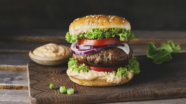 Burger on wooden board