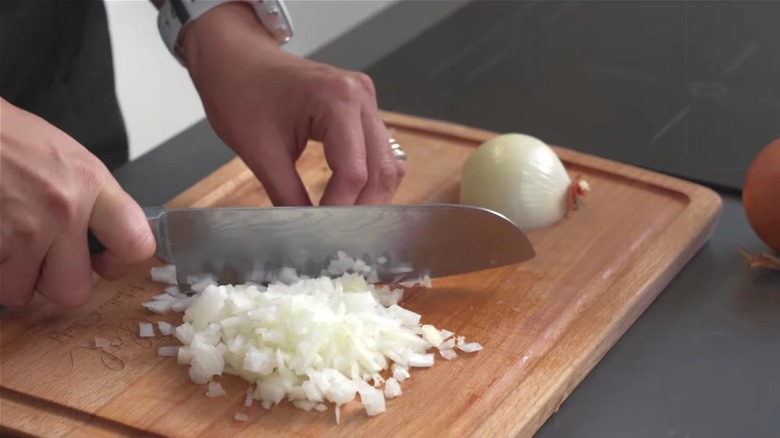 Onions being diced