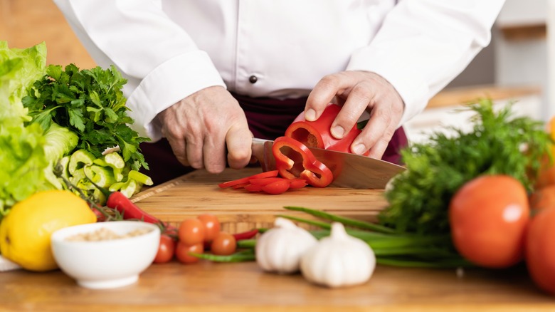 Chef cutting vegetables