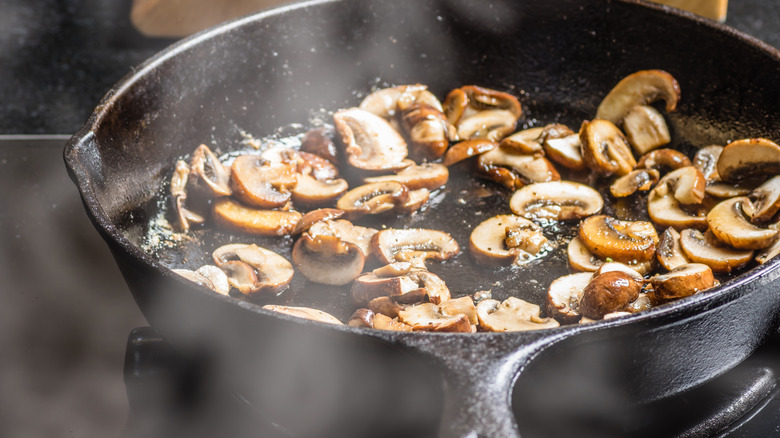 Sliced mushrooms in a pan