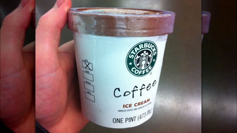 hand holding Starbucks Coffee ice cream pint