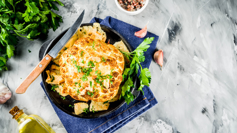 Whole roasted cauliflower with parsley and garlic