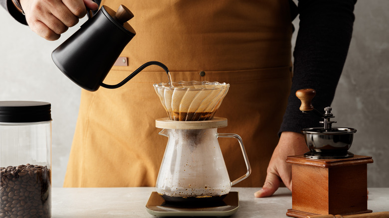 Man making pour over coffee