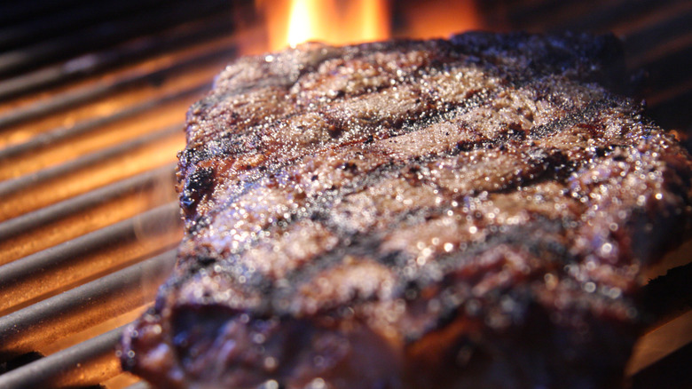 ribeye steak on a grill