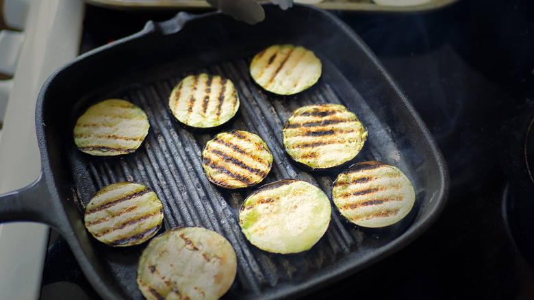 Eggplants on a grill