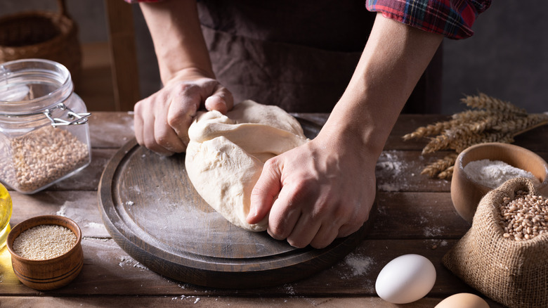 Person kneading dough