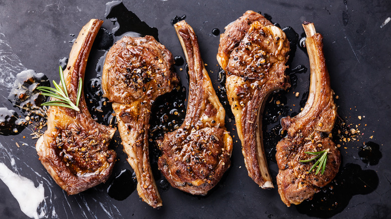 Grilled lamb on dark background