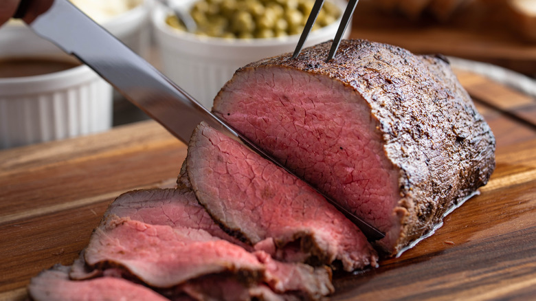 Roast beef being carved