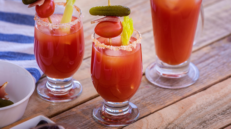 Bloody mary with various garnishes and salt rim