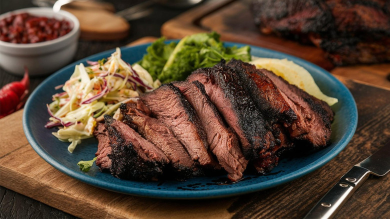 Plated brisket serving with coleslaw.