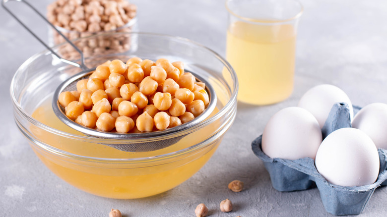 https://www.thedailymeal.com/img/gallery/why-you-should-never-get-rid-of-leftover-liquid-from-canned-beans/replace-eggs-while-baking-1692707625.jpg