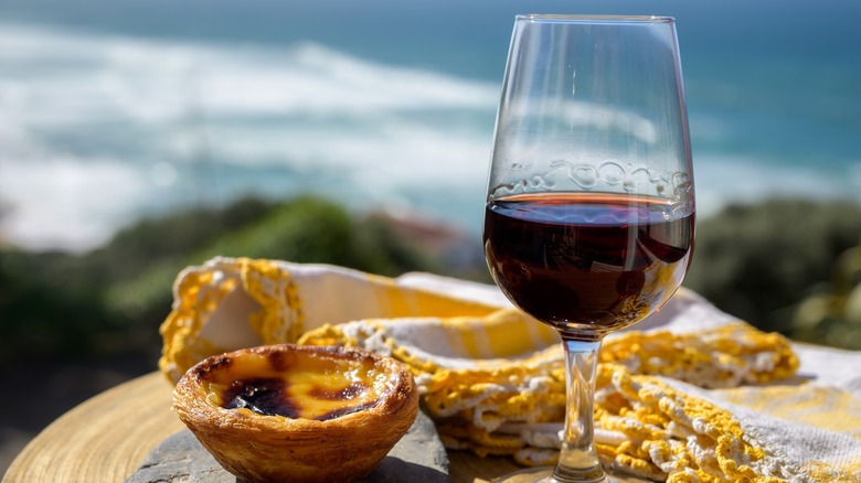 Glass of port wine in a coastal setting