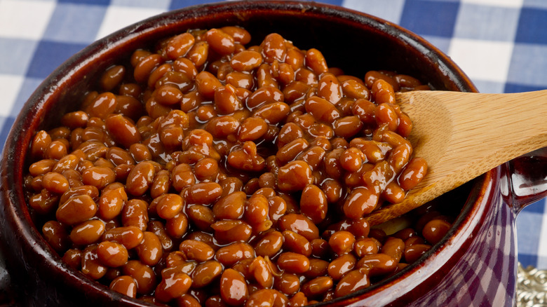 Baked beans on gingham tablecloth