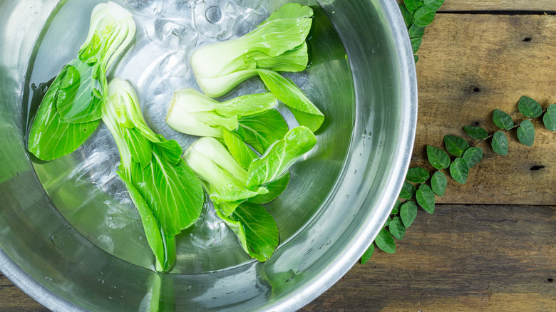 Greens in bowl of ice water