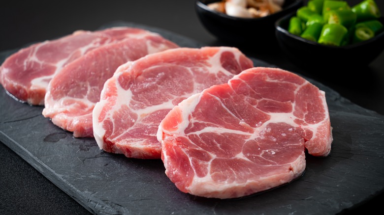 slices of raw pork