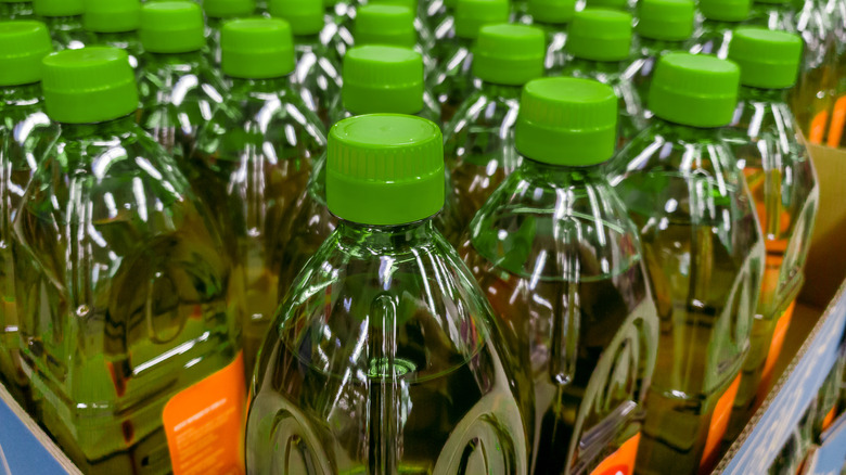 upper part of plastic bottles of oil