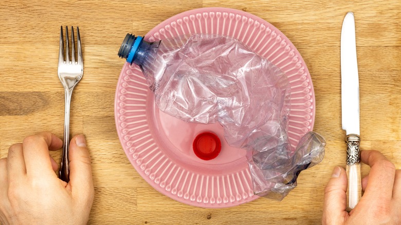 plate with a plastic bottle on it