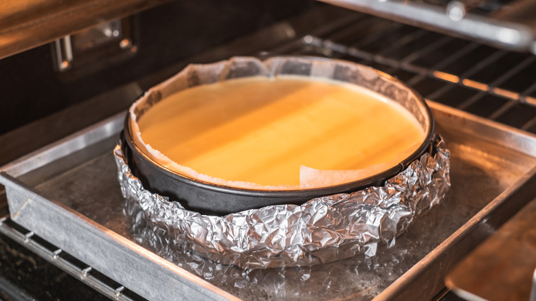 cheesecake baking in a water bath