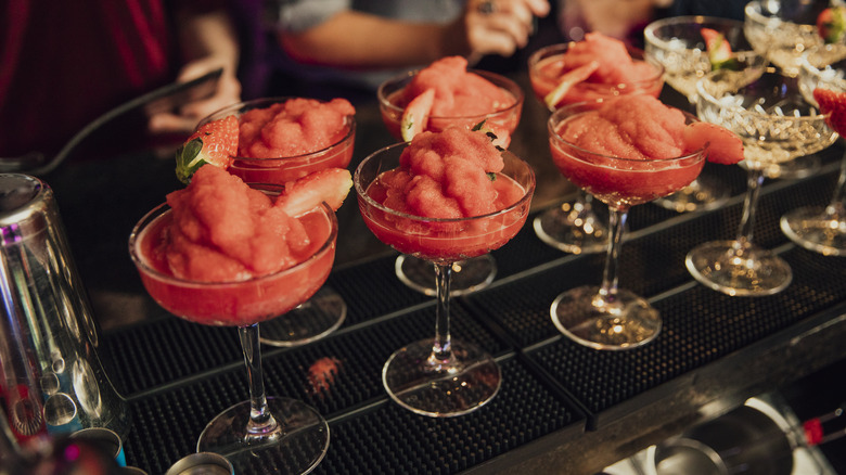 Three daiquiris on a bar