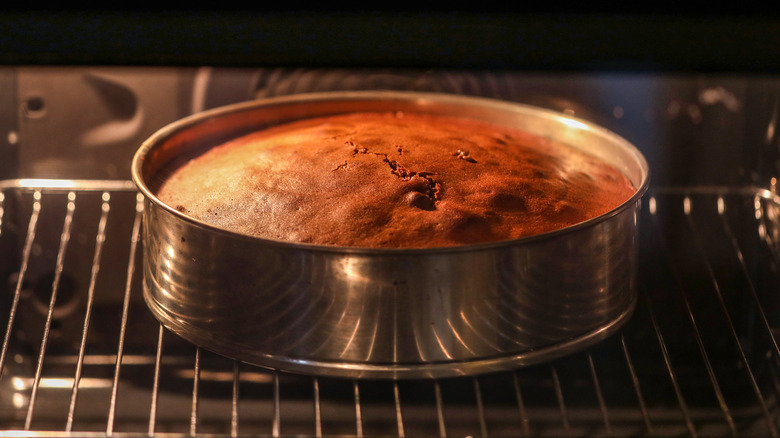 Cake baking in oven