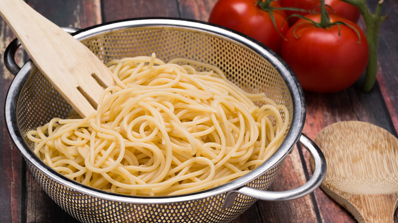 Spaghetti in steel colander