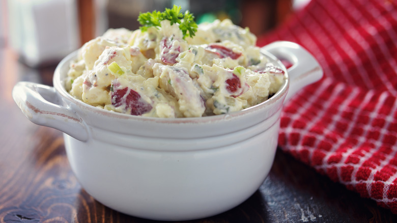 Ceramic dish of potato salad 