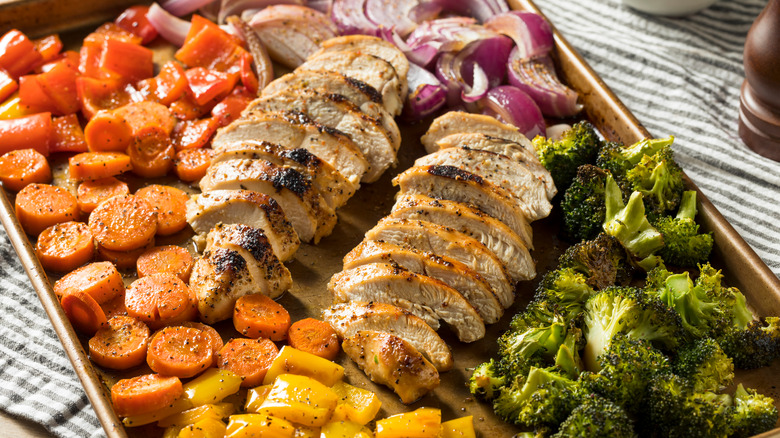 vegetables and chicken on sheet pan