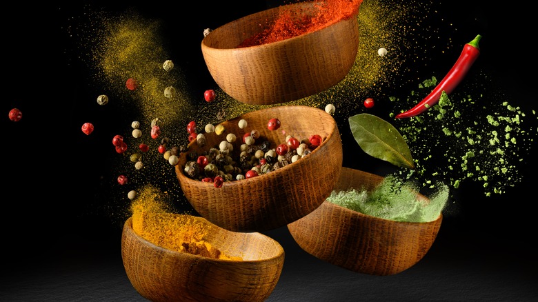 Colorful spices on a dark background