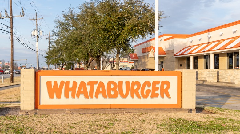 A Whataburger location and logo out front.