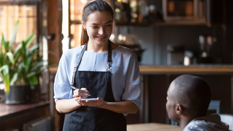 Server taking diner's order