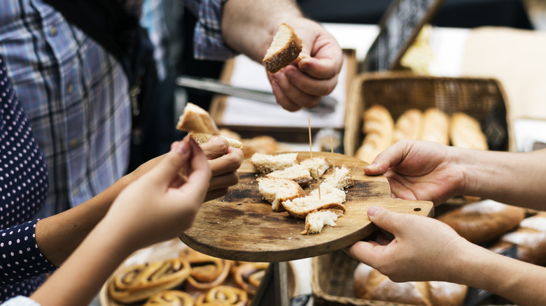 Samples being handed out at a grocery store