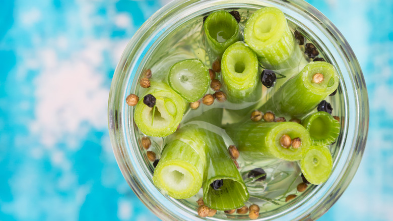 pickled green onions in a jar