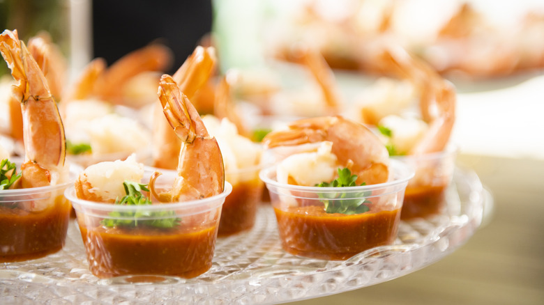 shrimp in cups with sauce